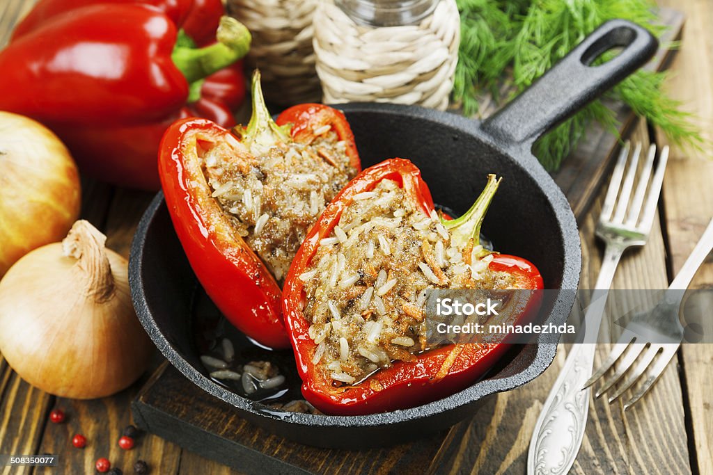 Stuffed paprika Stuffed paprika with meat and rice on the table Baking Stock Photo