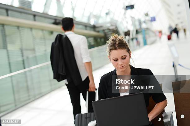 Business Woman In Public Station Working With Computer Wifi Area Stock Photo - Download Image Now
