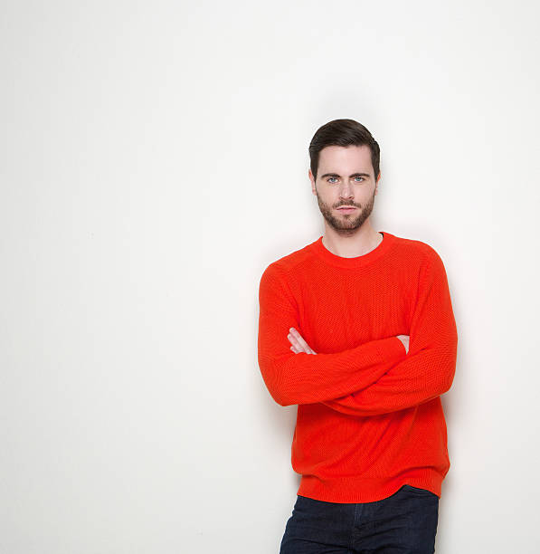 istock cool guy standing with arms crossed 508350579