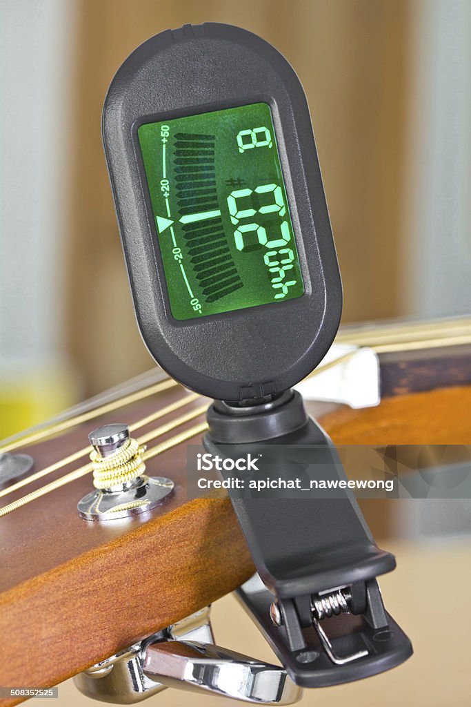 Tuner Guitar sound equipment. Clip tuner Equipment For tuning the guitar sound. Amplifier Stock Photo