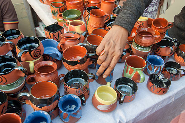 Kolkata, West Bengal, India - January 12, 2014: Terracotta cups, Artworks of handicraft, on display during the Handicraft Fair in Kolkata - the biggest handicrafts fair in Asia.