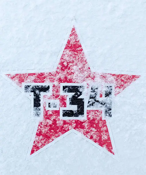 Russian T34 Tank in black font symbol sign using a red Soviet Style star, dusted in fresh snowfall for use in military or historical applications