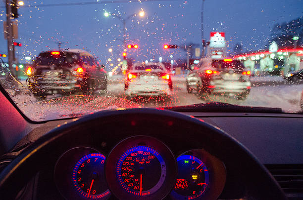 vista de dentro carro durante a condução noite tempestade de neve - car dashboard night driving imagens e fotografias de stock