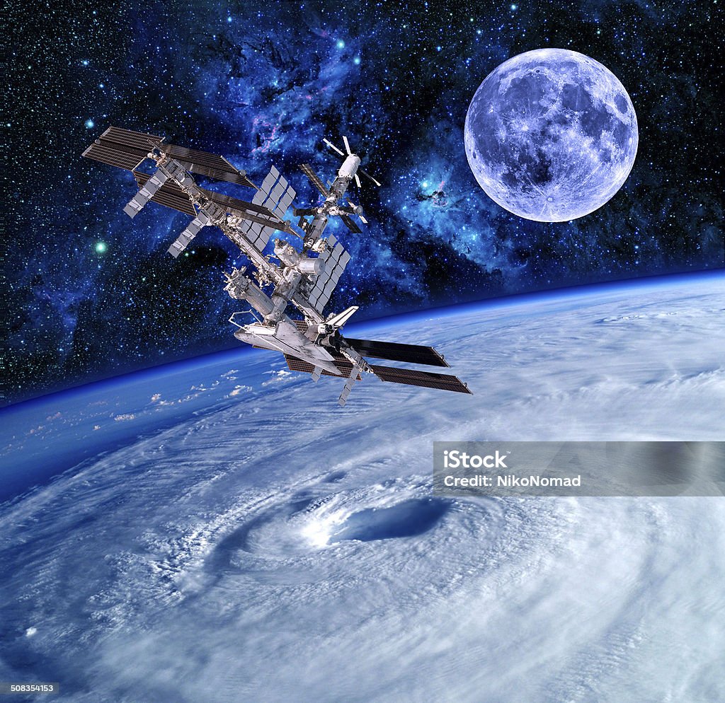 Earth Satellite Space Stars Earth satellite space station spaceship sky stars. Elements of this image furnished by NASA. International Space Station Stock Photo