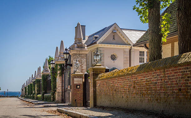 Newport, Rhode Island and the cliff walk Along the cliff walk in Newport, RI, there are some spectacular residential buildings open for the public to enjoy. newport rhode island stock pictures, royalty-free photos & images