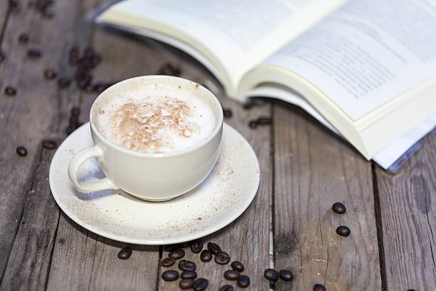 istock Cup of coffee on a wooden table 508354353