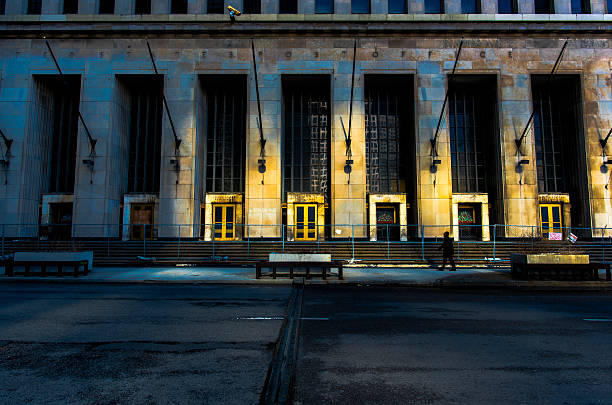 An artistic take on an abandoned building in the city, with contrasting color and light.