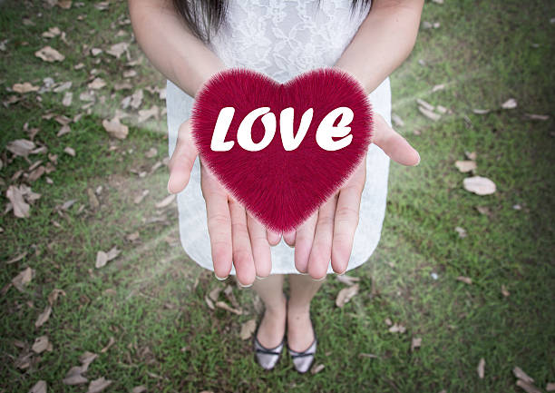 istock heart in  hands , Valentine`s day background 508374646