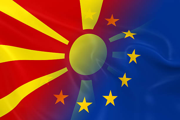 Macedonian and European Relations Concept Image - Flags of Macedonia and the European Union Fading Together