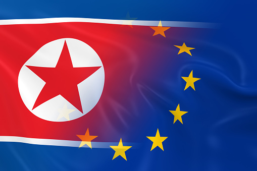 North Korean and European Relations Concept Image - Flags of North Korea and the European Union Fading Together
