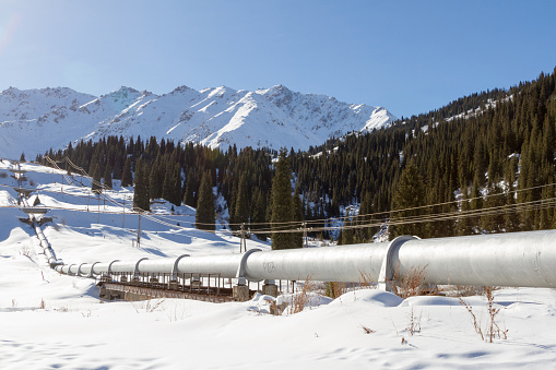 The Trans Alaska Pipeline makes it way across the many miles of Alaska.  The pipeline carries oil from Northern Prudoe Bay to the Port of Valdez in the South.