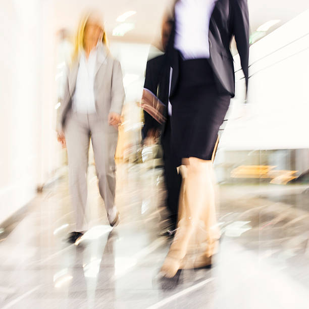 istock Businesspeople Walking in a Modern Interior 508376463