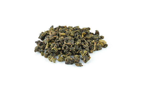 istock Green tea in clay teacup isolated on white 508376727