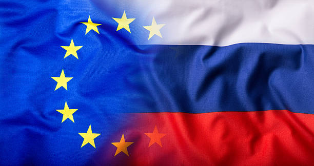 istock EU and Russia. EU Flag and Russia flag mixed 508377544