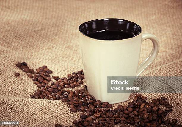 Cup Of Coffee And Beans Stock Photo - Download Image Now - Backgrounds, Black Color, Breakfast