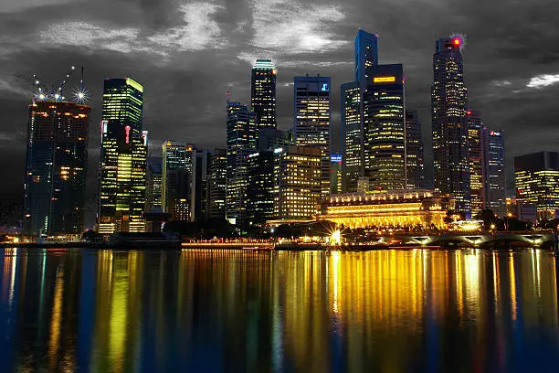 evening shot by marina bay. old singapore skyline.