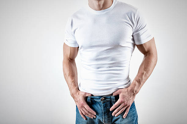 Muscular man wearing white T-Shirt stock photo