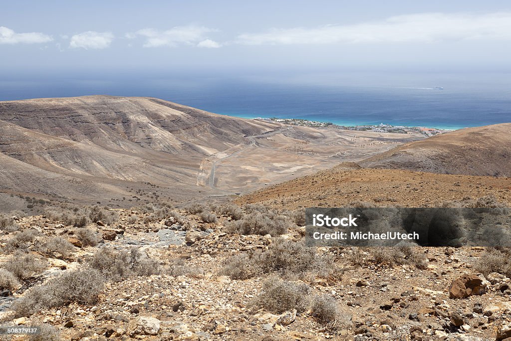 Jandia Coastline, Fuerteventura View of the coastline near Morro del Jable in Fuerteventura, Spain from the mountains. Atlantic Islands Stock Photo