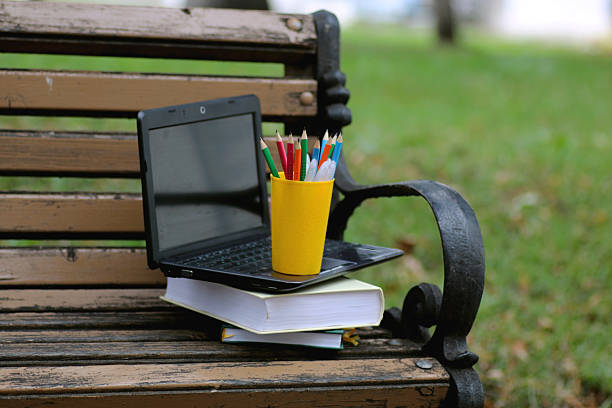 istock books on a bench in the school year 508381904