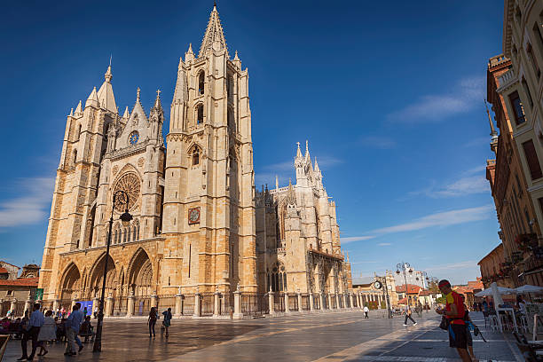Leon, Spain - September 25, 2015: Leon’s Cathedral on Plaza de Regla. Leon, the former Roman military encampment, is situated in the northwest part of Spain. Over the course of time, Leon became the capital of the kingdom Leon in the Middle Ages, a historic enclave on the Pilgrim's Road to Santiago de Compostela and a city perfectly suited to its inhabitants. Each year thousands of tourists attracted by Leon's historical and architectural heritage, are visiting the city.