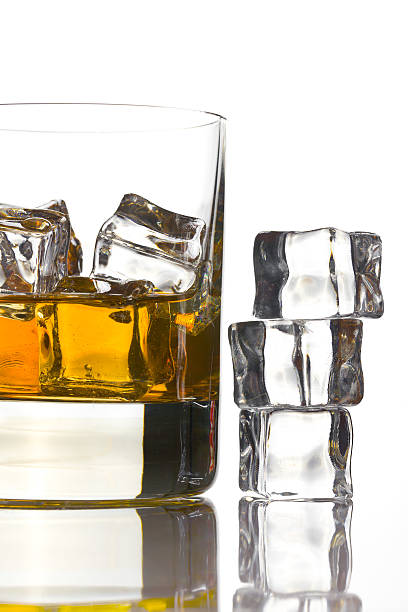istock whiskey with ice in glass 508384212