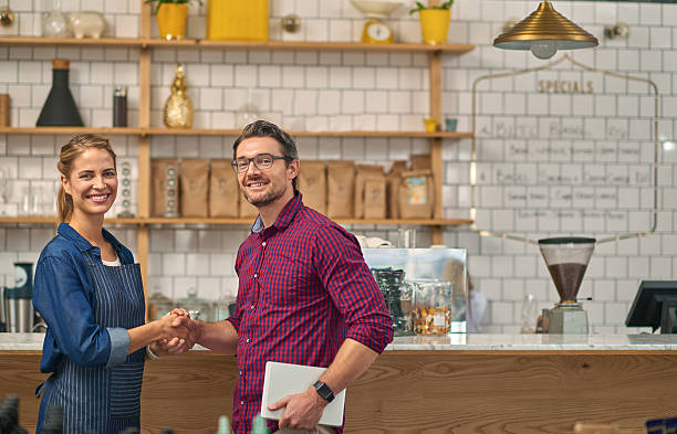 istock Baristas using digital tablet in coffee shop 508385700