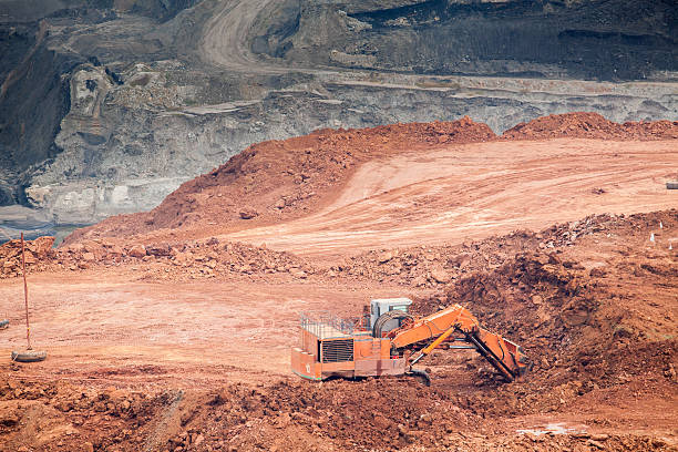 istock Part of a pit with big mining truck working 508386980