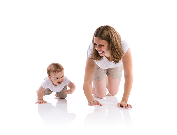 Beautiful mother with her son. Studio shot on white background.