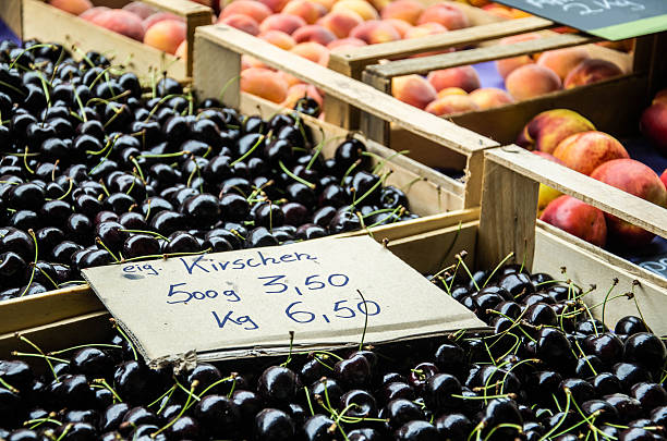 flea market - black cherries fotografías e imágenes de stock