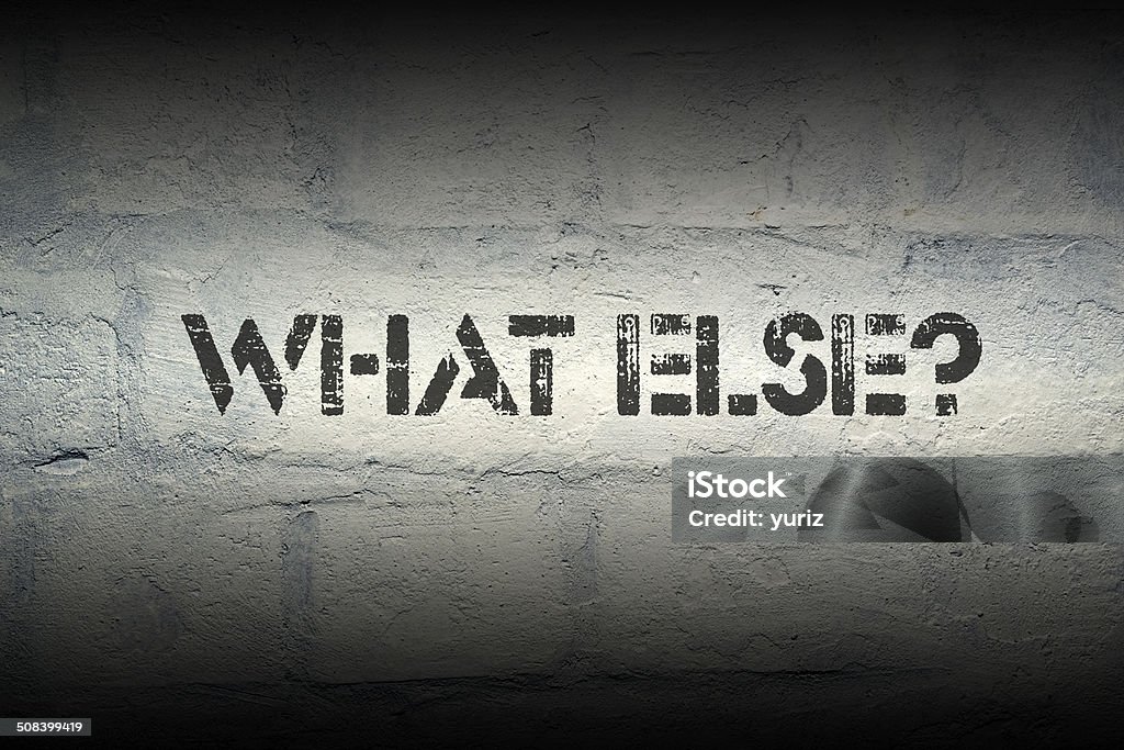 what else what else stencil print on the grunge white brick wall Asking Stock Photo