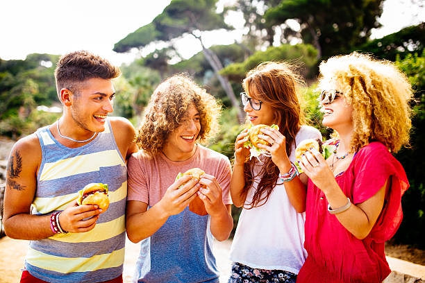 istock Friends Eating Burgers 508399793