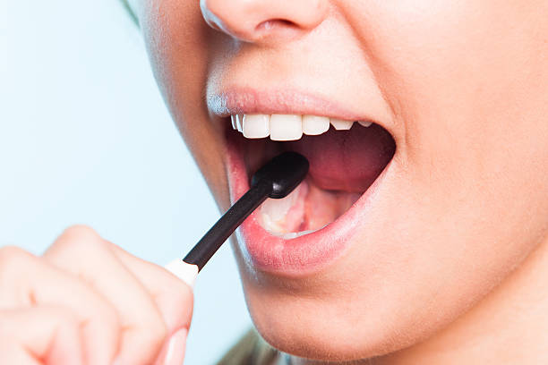 istock Girl cleaning teeth 508399831
