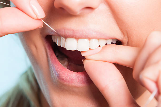 istock Girl showing teeth 508399835