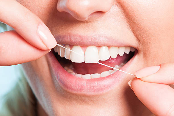istock Girl showing teeth 508399847