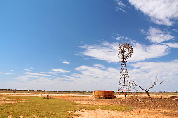 istock Windmill water pump in Australian outback 508400215