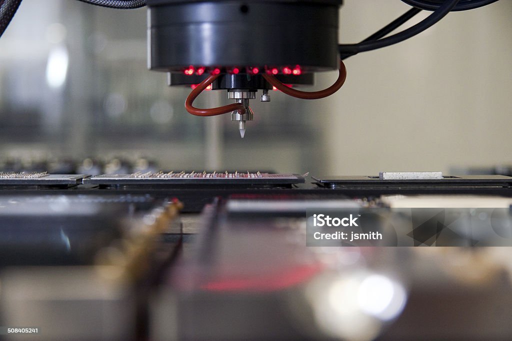 Manufacturing process of electronics Manufacturing process of electronics computer automated with robots Manufacturing Stock Photo