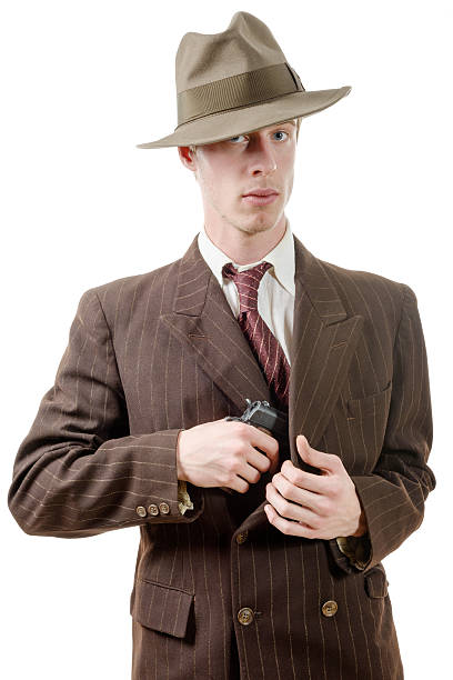 istock gangster in a suit vintage, with handgun 508407454
