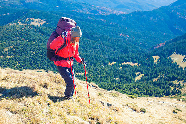 istock Woman walks down the slope. 508407500