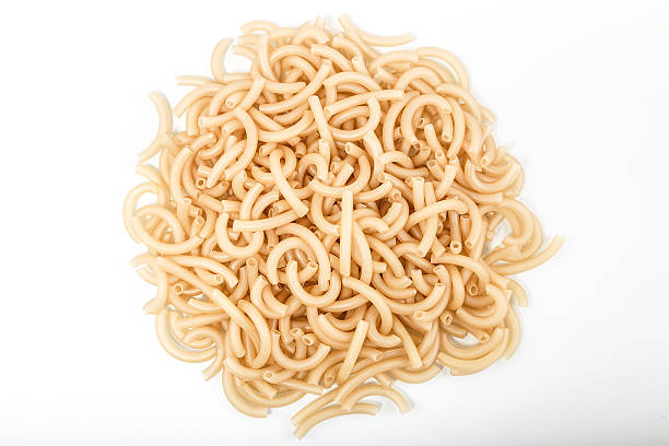 istock Mound of pasta on a white background close-up macro 508407688