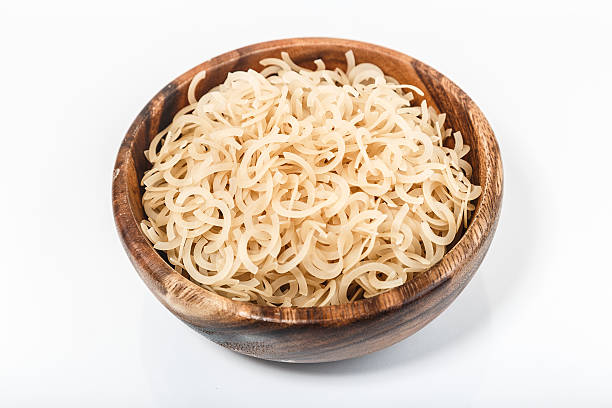 istock Mound of pasta on a white background close-up macro 508408890