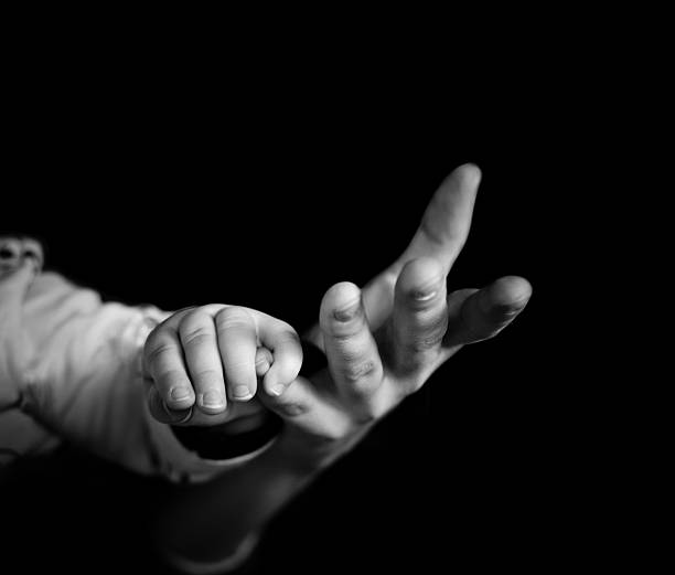 istock baby hand in mother's hand 508409050