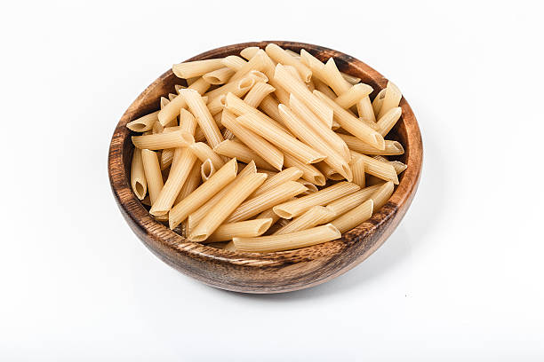 istock Mound of pasta on a white background close-up macro 508409590