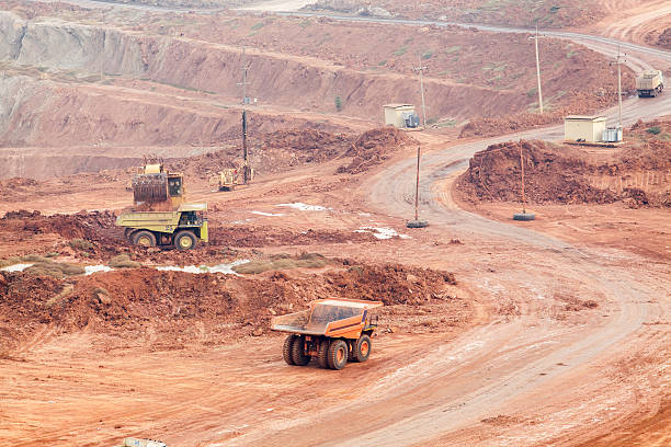istock Part of a pit with big mining truck working 508413090