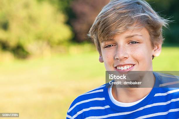 Happy Boy Male Child Teenager Smiling Stock Photo - Download Image Now - Teenage Boys, Adolescence, Agricultural Field