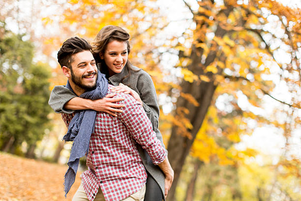 istock Young couple in the autumn forest 508413606