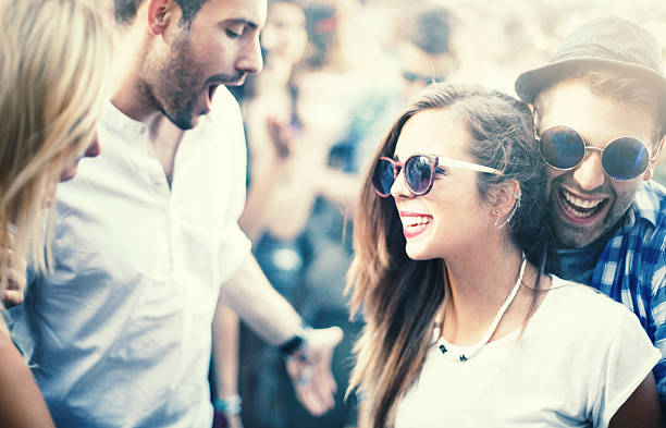 istock People enjoying a concert. 508414592