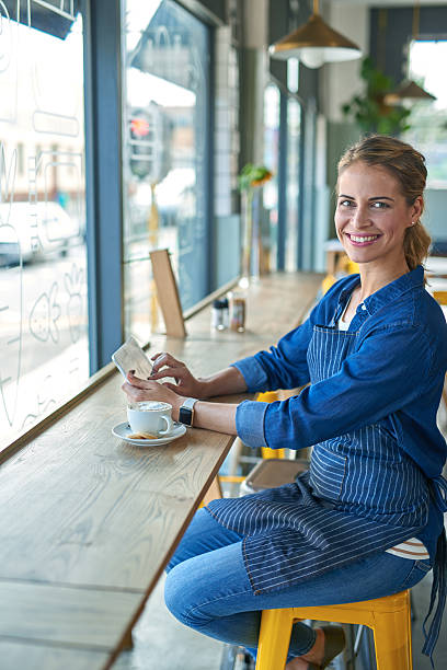 istock Young woman drinking coffee while surfing the net 508414910