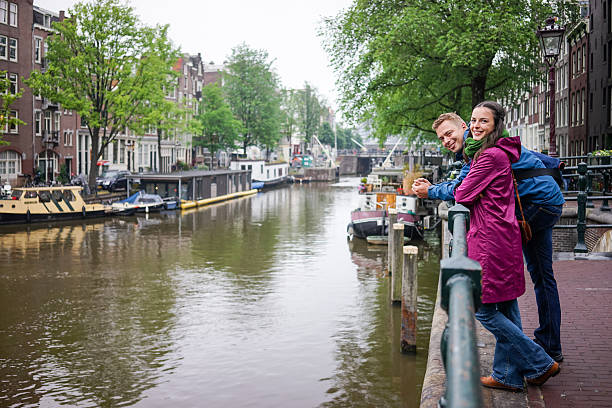istock Couple in Amsterdam rainy day 508415018