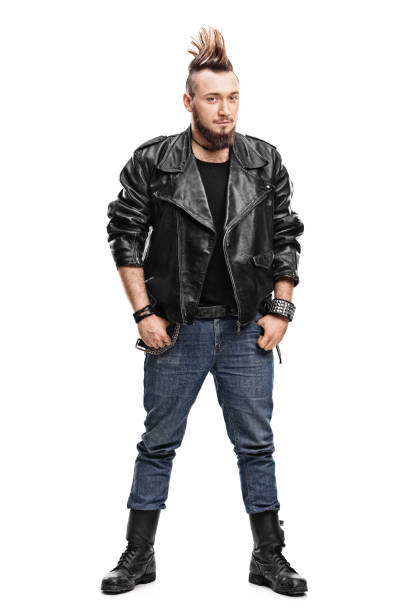 Male punk in a leather jacket and boots Full length portrait of a young male punk in a black leather jacket and black boots isolated on white background mohawk stock pictures, royalty-free photos & images