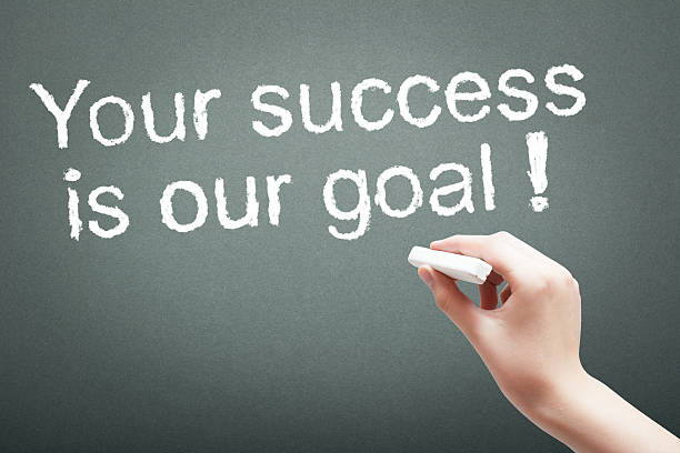 istock Hand writing with chalk success concept 508418158